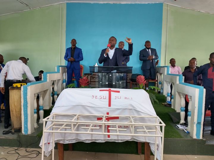Bishop Faustin leading worship in DR Congo